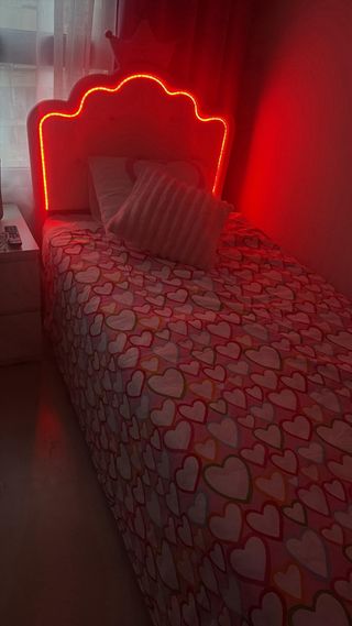 Cama canapé con almacenaje rosa