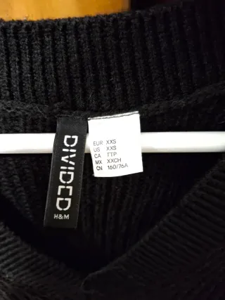 Chaleco de punto negro sin mangas