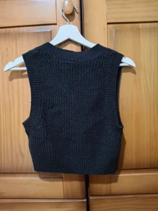 Chaleco de punto negro sin mangas