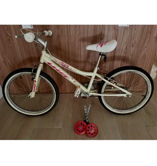 Bicicleta niña 20 crema con ruedas de apoyo