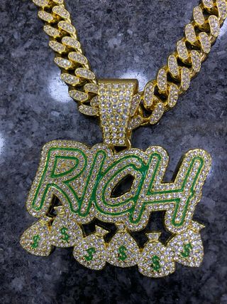 Collana Rich con diamanti e sacchi di denaro