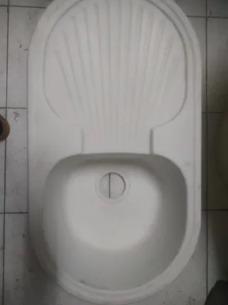 Fregadero de porcelana con escurridor