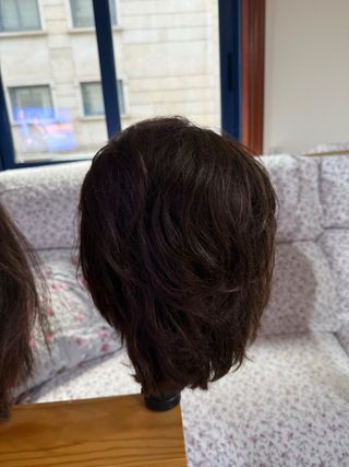 Cabeza maniquí peluquería con soporte.