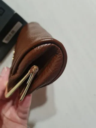 Portamonete Carpisa marrone con tartaruga