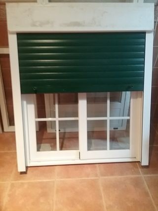 Ventana.climalix y puerta de aluminio con fijo.