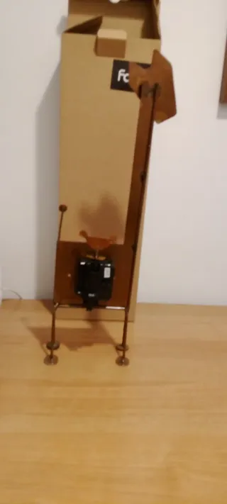 Orologio da tavolo giraffa verde, con pendolo.