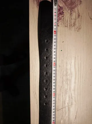 Cintura nera con fibbia floreale argento