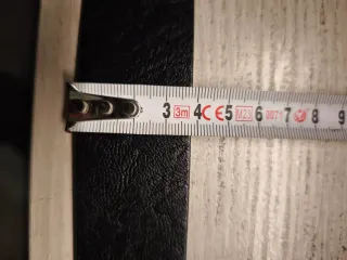 Cintura nera con fibbia floreale argento