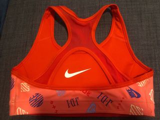 Top deportivo Nike naranja talla S