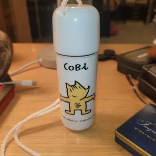 Guarda objetos Cobi blanco con cordón