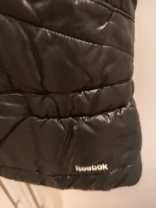 Chaleco deportivo Reebok mujer.