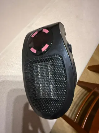 Calentador de enchufe portátil