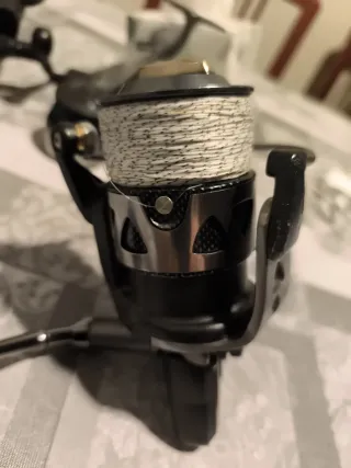 Carrete de pesca pluma trio 55