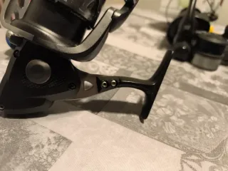 Carrete de pesca pluma trio 55