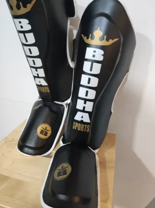 Guantes y espinilleras Buddha