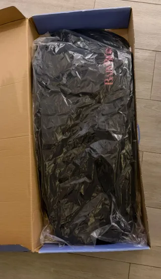 Mecedora Babybjörn gris con juguete