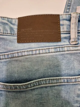 Pantalón vaquero desgastado