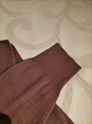 Jersey de cuello Perkins punto fino.