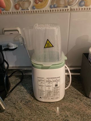 Calienta biberones Momcozy