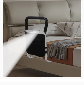 Barrera de cama de seguridad con luz y bolsa.