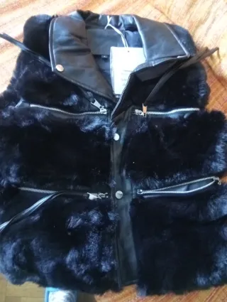 Chaleco pelo negro cremalleras