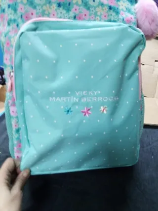 Mochila floral con corazón rosa