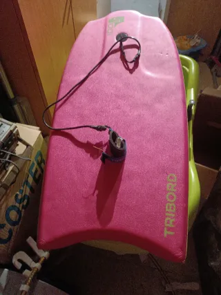 Tabla de playa rosa con leash