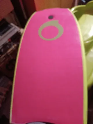 Tabla de playa rosa con leash