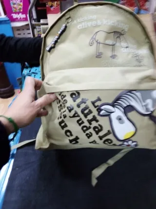 Mochila beige con estampado de animales