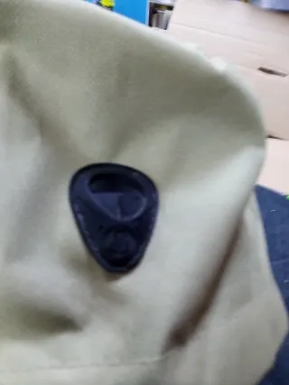 Mochila beige con estampado de animales