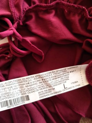 Camiseta morada con volantes