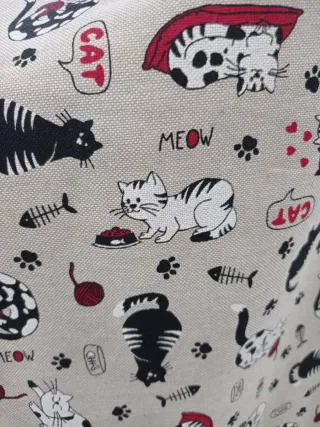 Tela con estampado de gatos