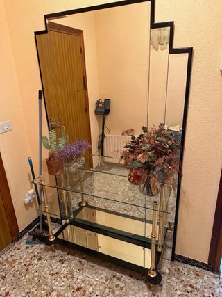 Recibidor de cristal con espejo