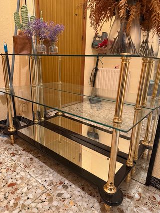 Recibidor de cristal con espejo