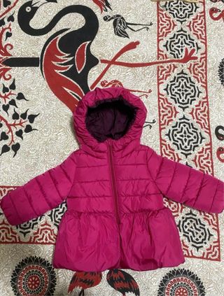 Piumino bambina fucsia con cappuccio