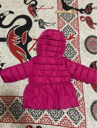 Piumino bambina fucsia con cappuccio