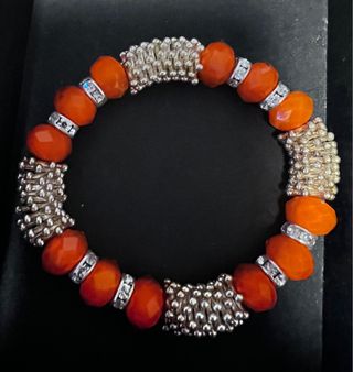 Bracciale elastico arancione e argento