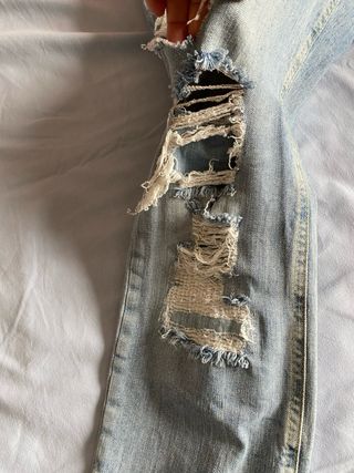 Jeans vintage a gamba dritta strappati