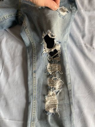 Jeans vintage a gamba dritta strappati