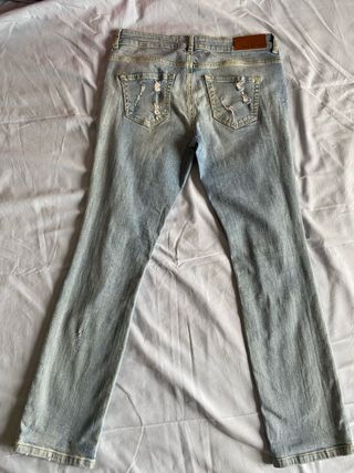 Jeans vintage a gamba dritta strappati