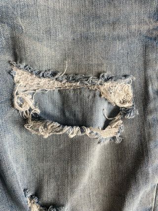 Jeans vintage a gamba dritta strappati