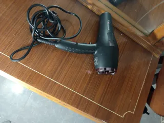 Secador de pelo negro como nuevo