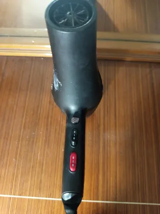 Secador de pelo negro como nuevo