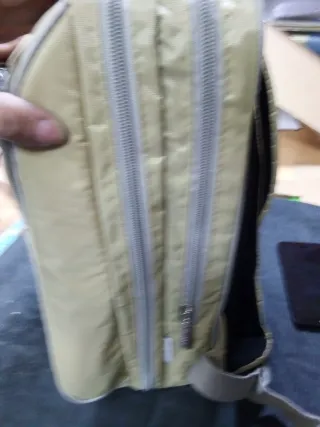 Mochila beige con estampado de animales