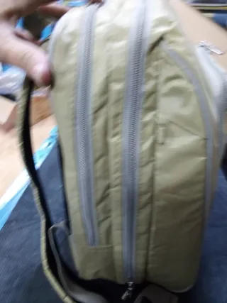 Mochila beige con estampado de animales