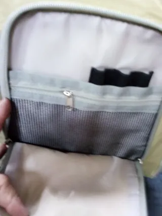 Mochila beige con estampado de animales