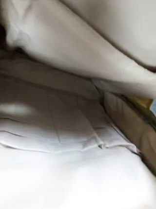 Mochila beige con estampado de animales