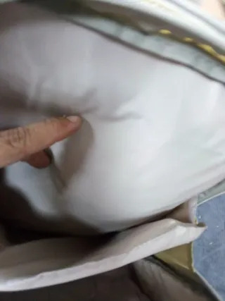 Mochila beige con estampado de animales