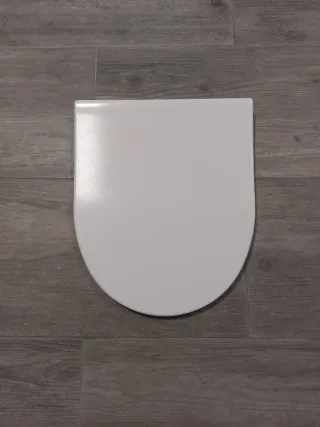 Tapa de inodoro blanca