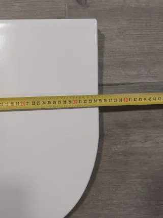 Tapa de inodoro blanca